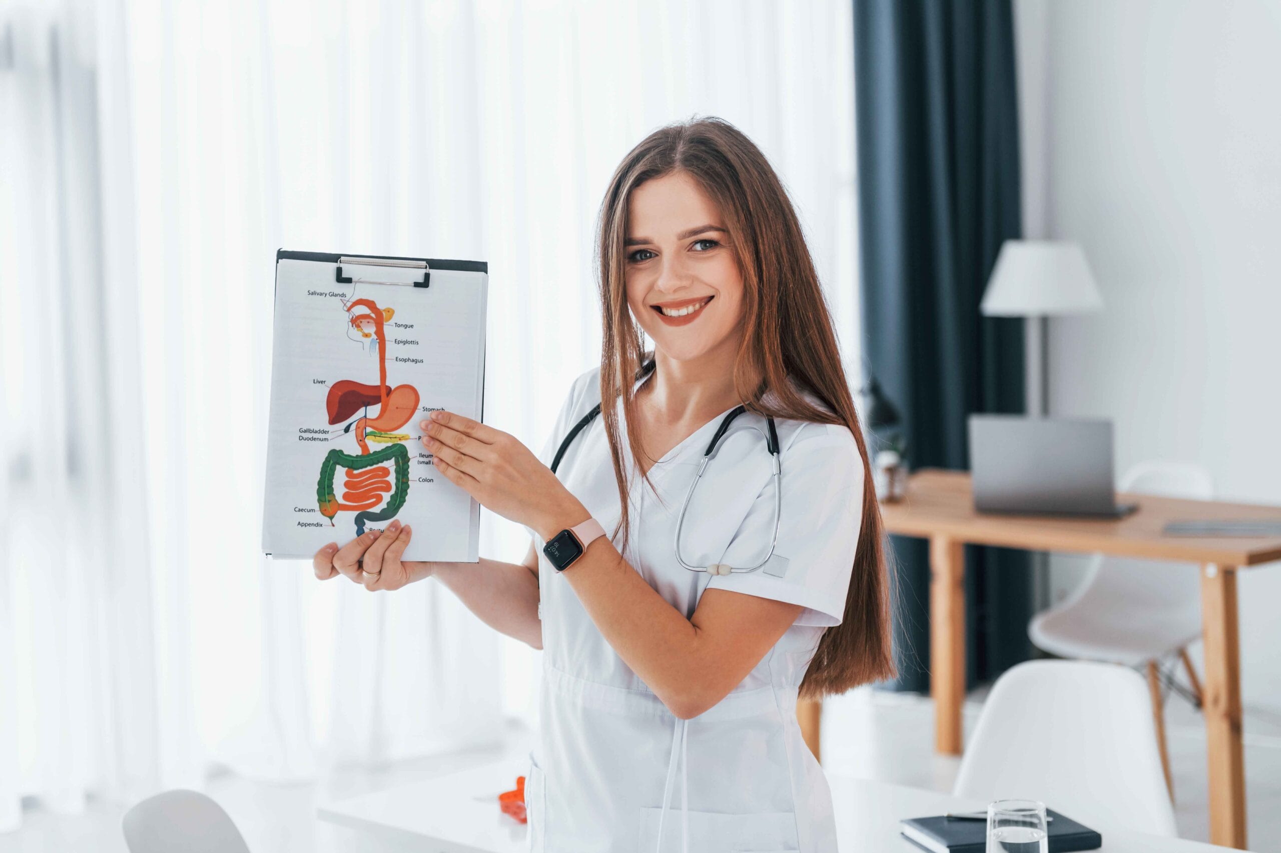 Understanding and Managing Gut Health and Digestive Disorders 1 woman holding illustration professional medical w 2023 11 27 05 09 54 utc 11zon scaled